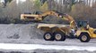 Moving Earth - VOLVO A40F and KOMATSU HM300 dump trucks, CAT 330DL Excavator.