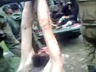 Pakistan Army captured Taliban and taking him to prison