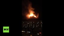 RAW: Huge blaze rages through 16-story building in Grozny