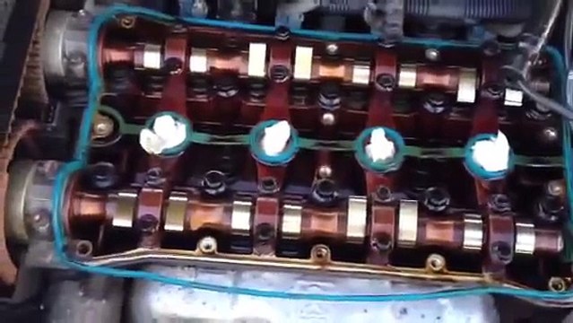 Chevy Aveo valve cover gasket oil on spark plugs change