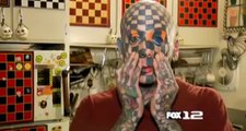 Human checkerboard' gets eyeballs tattooed