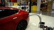 Tentacle-Like Robot can charge you electric Tesla Car - Model S Sedan