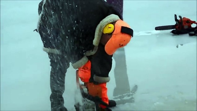 People created spinning Ice Carousel on frozen Lake with Chainsaw and motor boat engine!