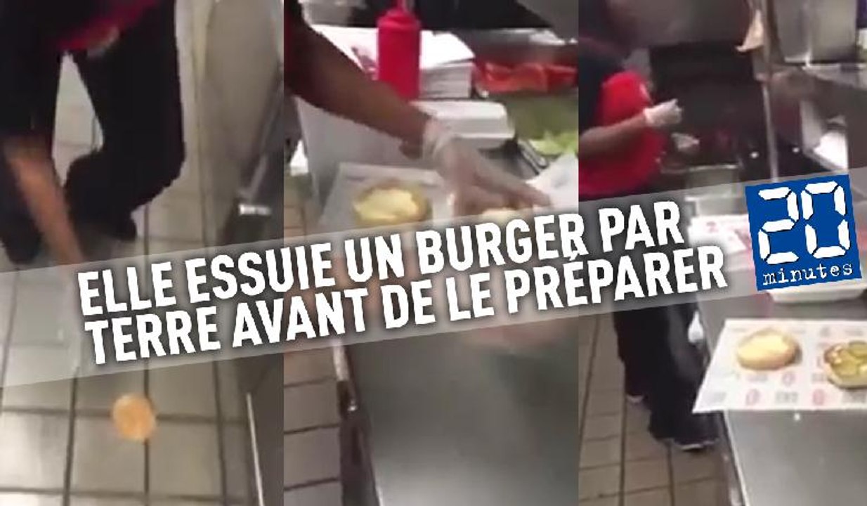 Une employée essuie un burger par terre avant de le préparer