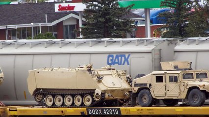 Ahead of Raider Focus_ 1_4 Mile Long Military Train Loaded Down Near Border of Wyoming and Colorado