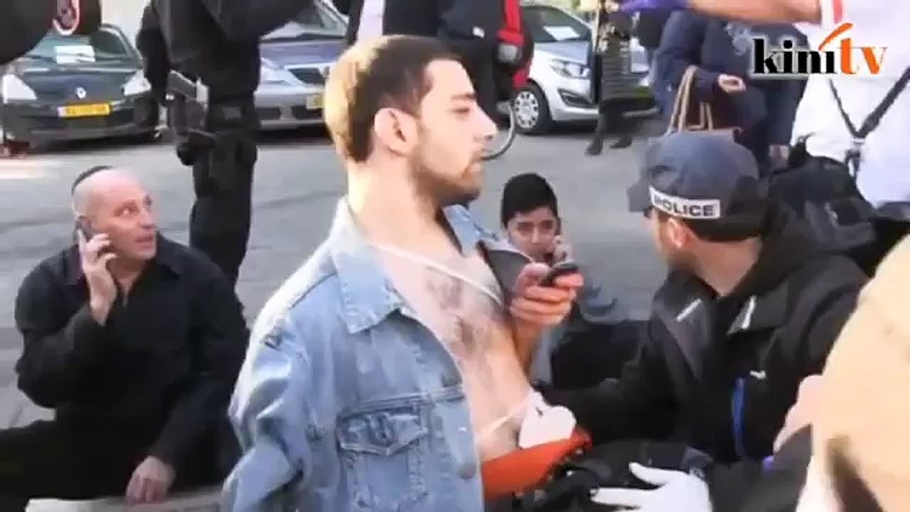 12 wounded in Palestinian knife attack on Tel Aviv bus