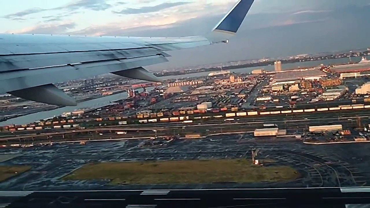 Airplane taking off with the view of New York City