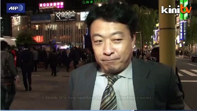 Abe calls snap Japan poll, delays tax hike