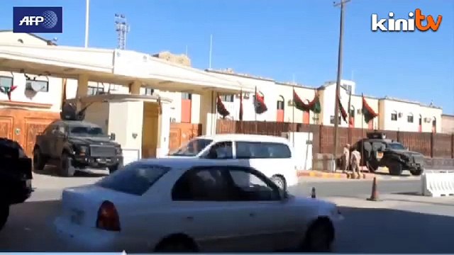Former Gaddafi regime official appear behind bars in Tripoli