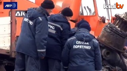MH17 wreckage removal starts in rebel-held east Ukraine