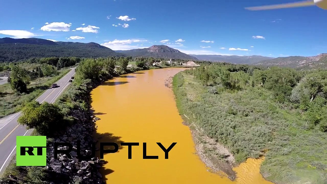 Orange Animas River in Colorado after EPA spills 1mn gallons waste