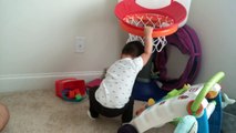 14 mos - Theo dunks basketball
