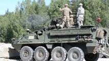 U.S Soldiers Firing the Monstrously Powerful MK19 Grenade Launcher on Stryker