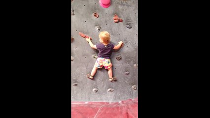 Baby climbing indoors