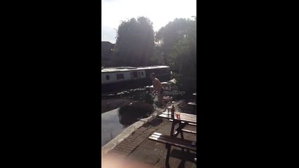Man tries to jump onto canal boat