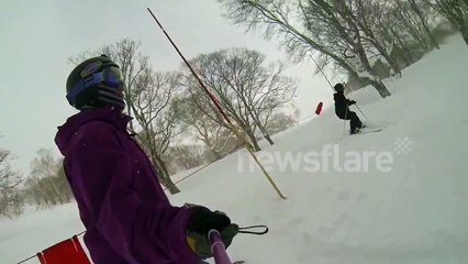 Snowboarder hit by chairlift