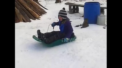 Girl having sled problems