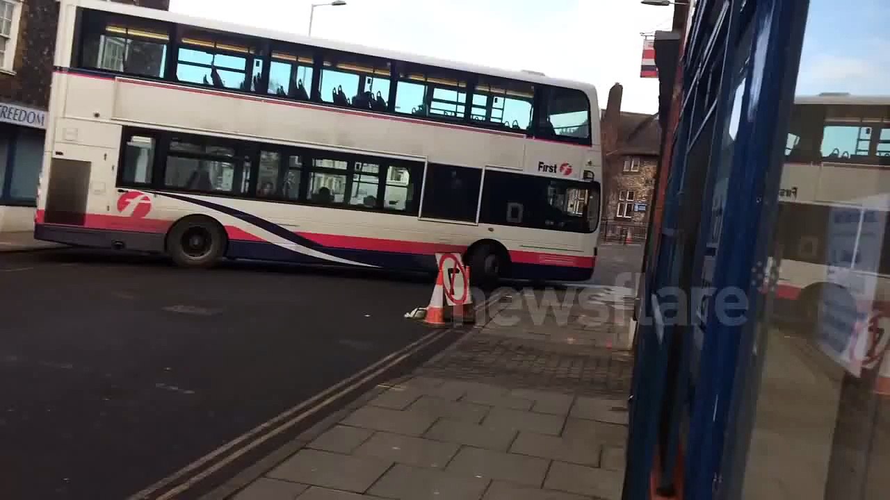 Bus driver attempts challenging turn