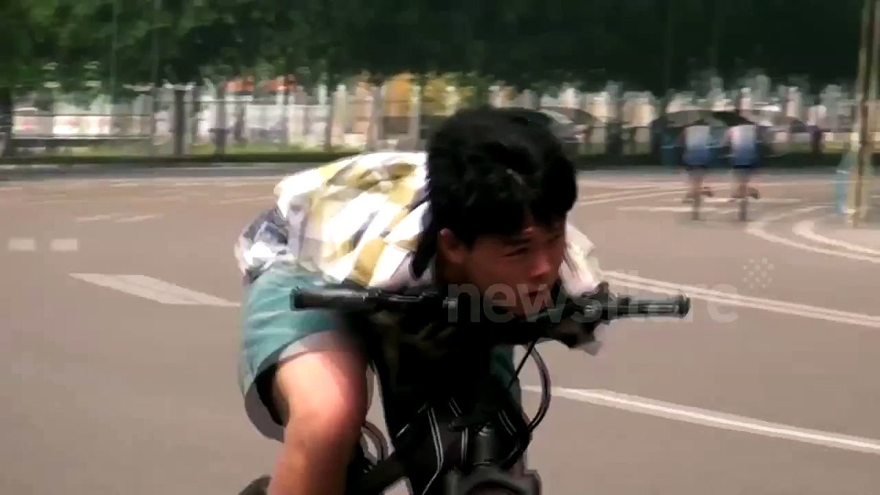 Armless man cycles