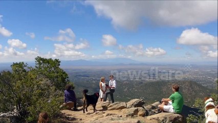 Bride saves groom from falling off a cliff