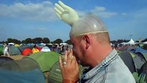 Man puts rubber glove over his face