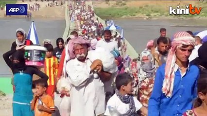 Survivors of Iraq jihadist siege stream into camps