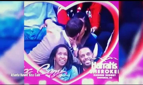 Kiss Cam Beer Fail! Couple kiss, and beer is spilled ALL OVER another couple - but was it staged?