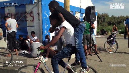 The man who helps the stranded Calais migrants phone home