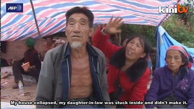 Bundles of cloth wrap brutality of Chinese earthquake