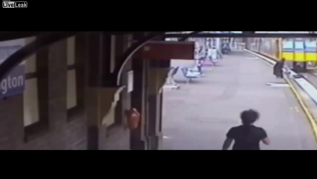 Woman saves schoolgirl from train tracks with seconds to spare