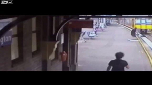 Woman saves schoolgirl from train tracks with seconds to spare