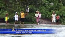 Children Walk Through River to Get to School