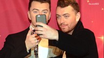 Sam Smith takes selfies with 'wax Sam Smith' at Madame Tussauds