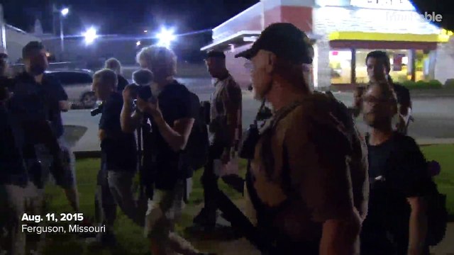 Who are Ferguson's 'Oath Keepers,' and why are they patrolling the city with guns?