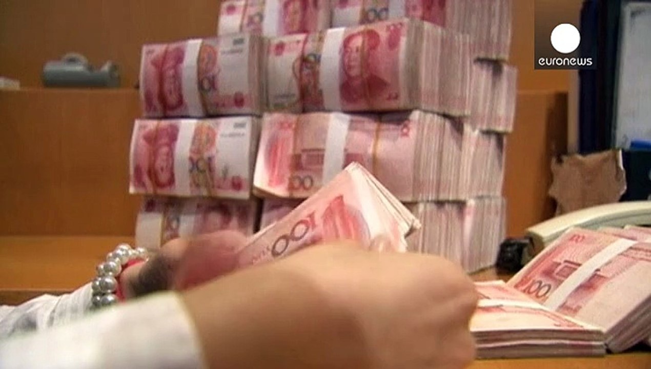 Stocks fall as China devalues yuan currency for second straight day