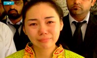 Chinese Lady  in court against her Husband