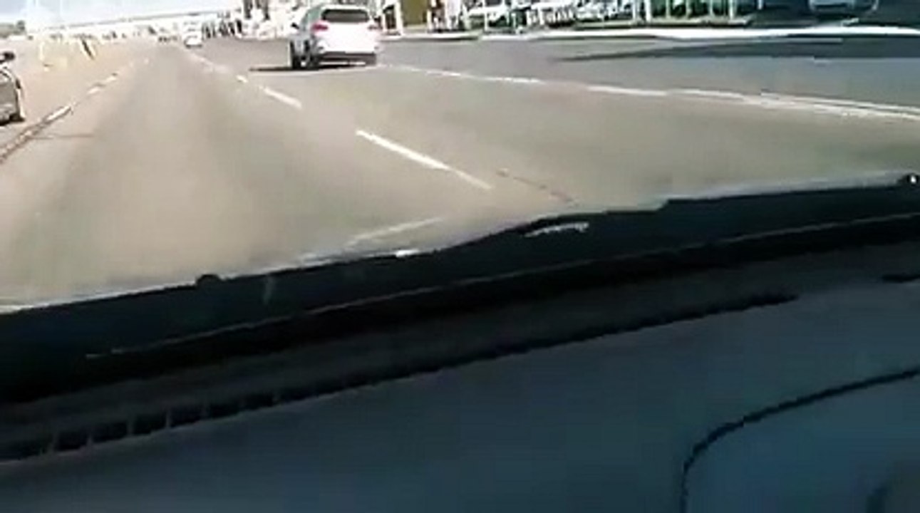 A car driving on the highway without tire... Insane driver!