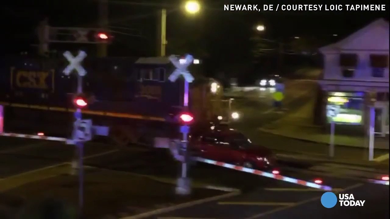 Watch: Train slams into SUV after officers rescue driver