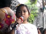 Little girl singing in the rain, Kate Francesca Campo sings Alamid's Your Love