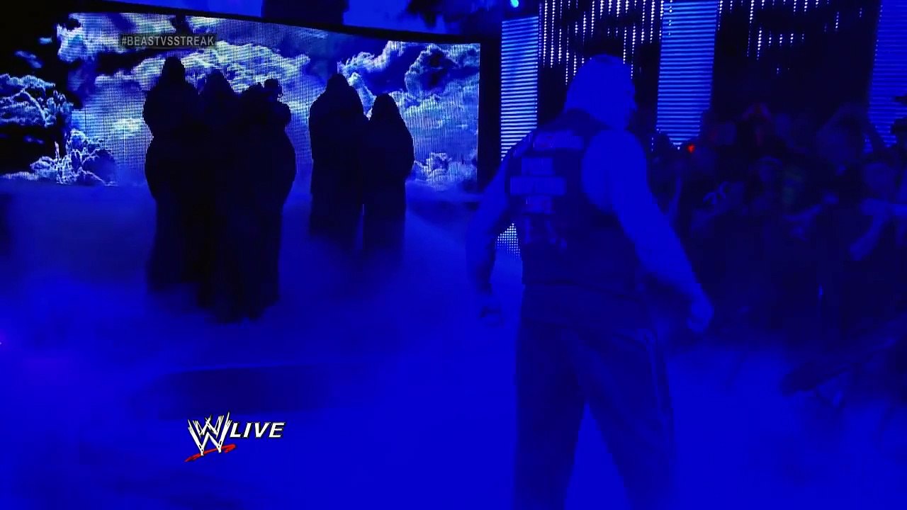 Undertaker rises from a coffin to attackUndertaker rises from a coffin to attack Brock Lesnar- Raw_  Raw_ March 24_ 2014