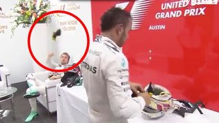 Lewis Hamilton throw a cap to Nico Rosberg but he throws back to hamilton's face
