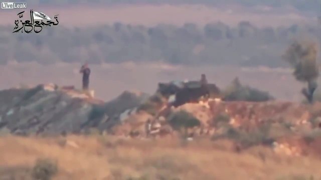 LiveLeak - A Syrian patriot destroys an assad crime dynasty 14.5mm gun position, with a TOW ATGM