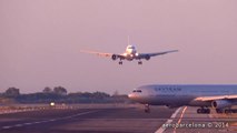 2 airplanes about to crash : one is landing and the other trying to take off in Barcelona!