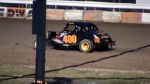 Vintage Dirt track modified collides with another car and nearly rolls over.