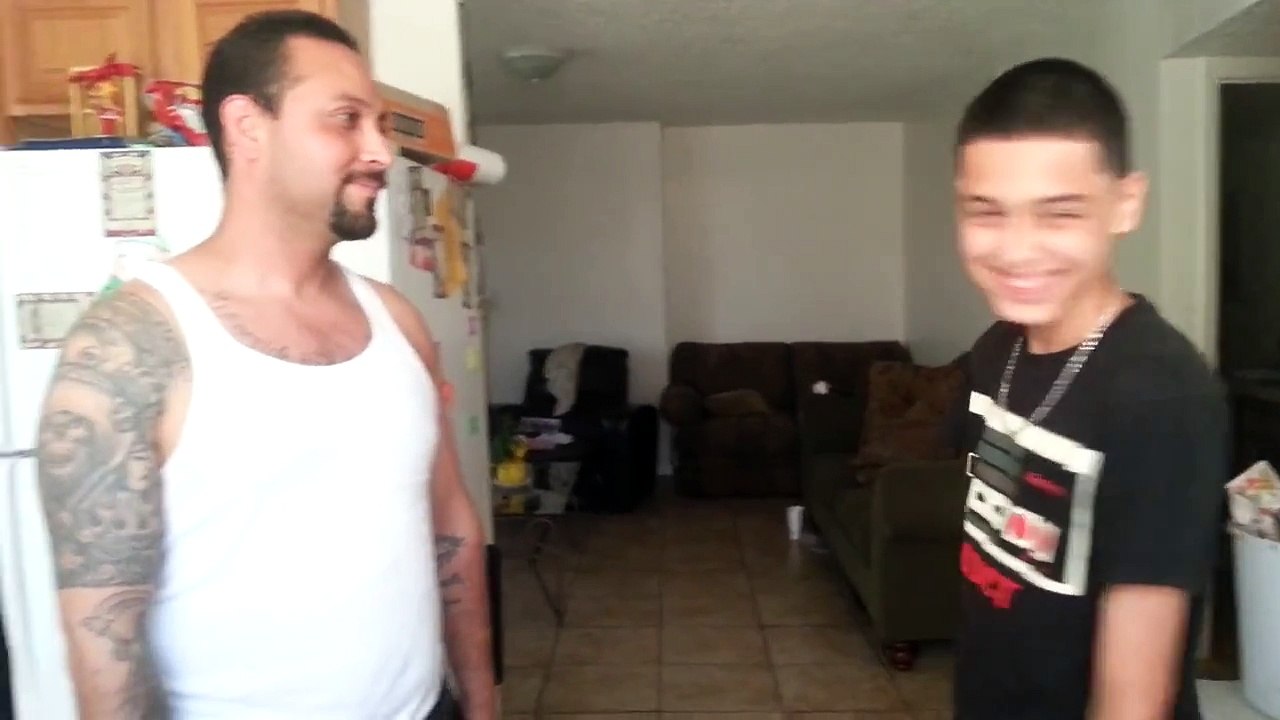 Father and son slap fight