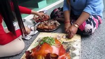 Yummy Chinese New Year food grilled pig or pig roast (cuisine).mp4