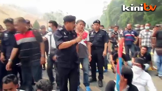 Padang Merbok campers charge towards Parliament, 26 detained