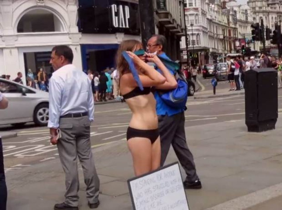 Girl Undresses in Public for Courageous Cause