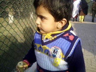 little boy shah aman playing