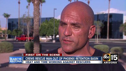 Crews rescue man out of Phoenix retention basin